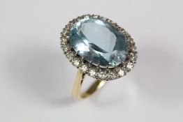 An 18ct Yellow White Gold and Aquamarine Ring