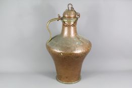 A Large Portuguese Copper Flagon