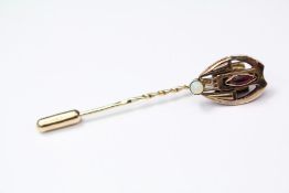 An 14 ct Rose Gold Art Nouveau Suffragette Brooch