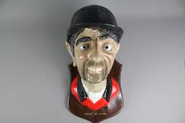 A Composite Figure of the Head of a Huntsman