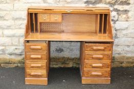 An Oak Roll Top Desk