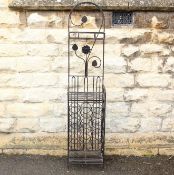 A Wrought Metal Wine Rack Stand