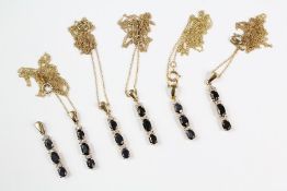 Six 9ct Sapphire and DIamond Pendants