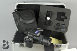 A Sony CyberShot DSC-R1 Camera and Sony Hard Camera Case