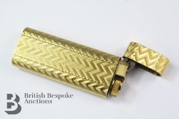 An 18k Plated Gold Cartier Lighter