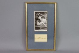 A Black and White Photographic Postcard and Autograph