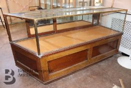 A Heavy Brass and Glaze Topped and Fronted Display Unit