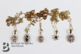 Five Silver Gilt Pendants
