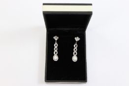 Pair of Silver Opal and Zirconia Drop Earrings