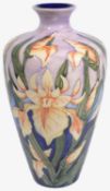 A modern Moorcroft pottery 'Windrush (Yellow Iris)' pattern vase designed by Debbie Hancock