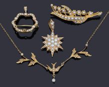 A delicate Continental gold and seed pearl set swallow necklace