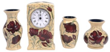Moorcroft pottery 'Chocolate cosmos' pattern mantel clock; others