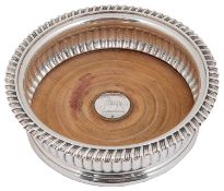 A George IV silver wine coaster