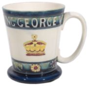 A Moorcroft pottery George VI 1937 Coronation Commemorative Mug