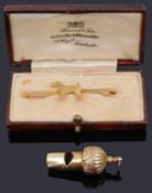 A 9ct gold bar brooch in the form of a terrier together with a dog whistle