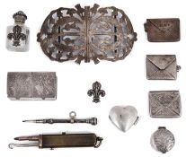 An Edwardian silver nurses buckle, silver stamp envelopes; others
