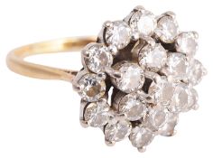 A large Continental diamond set circular cluster dress ring