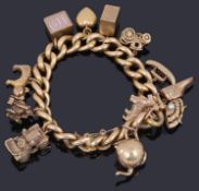 A 15ct gold curb link bracelet suspended with various charms