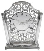 A modern silver Asprey mantle clock