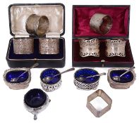 A small collection of late Vict. and 20th c silver napkin rings and salt cellars