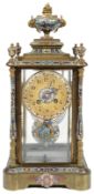 A late 19th c French gilt brass and champleve enamel four glass mantel clock