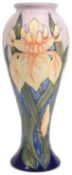 A modern Moorcroft pottery 'Windrush (Yellow Iris)' pattern vase designed by Debbie Hancock