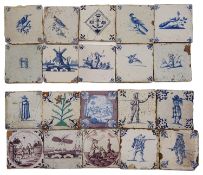 A collection of twenty Dutch Delft blue and white tiles