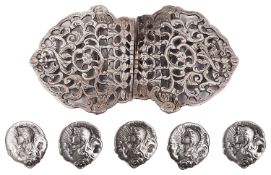 A set of five Edward VII Art Nouveau silver buttons and a late Vict. silver nurses' buckle