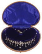 An exquisite Edwardian diamond necklace converting to a tiara,