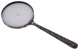 A late Victorian silver handled magnifying glass