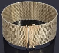 A gold milanese bracelet marked 585