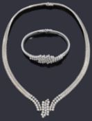 A charming Continental white gold diamond necklace with matching bracelet,
