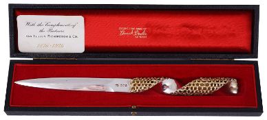 A Stuart Devlin silver and parcel gilt paper knife