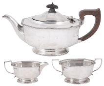 A George V silver three piece tea service