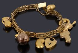 A 9ct gold three row charm bracelet with padlock and nine assorted charm and another loose charm