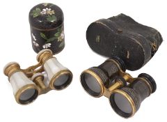 Two pairs of late 19th century gilt metal opera glass