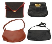 A collection of four designer handbags