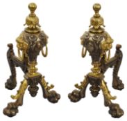 A pair of large late Victorian polished steel and brass andirons
