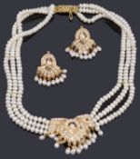 An Indian freshwater pearl necklace and matching earrings