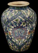 A large 19th century Iznik pottery polychrome tin glazed vase