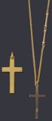 Two gold cross pendants and a chain