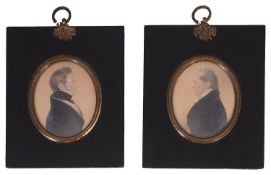 A pair of early 19th century British School portrait miniatures of gentleman