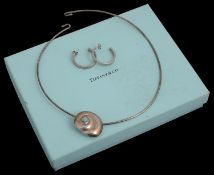 A Tiffany & Co silver shell pendant necklace