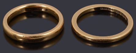 A 22ct gold court shaped wedding ring