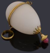 A late 19th century French gilt metal mounted frosted glass egg shaped etui for a child