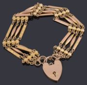 A Victorian gold four row fancy link bracelet with padlock