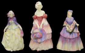 Three pre war Royal Doulton porcelain figures