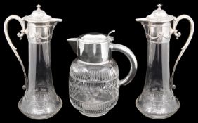 A pair of early 20th c Polish cut glass claret jugs with silver plated mounts and a lemonade jug
