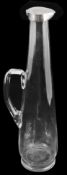A late Victorian silver mounted tall clear glass claret jug