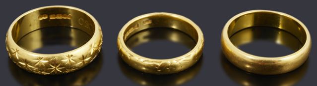 Three 22ct gold wedding bands